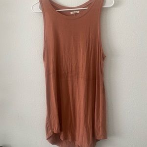 Maurice’s long salmon colored tank top